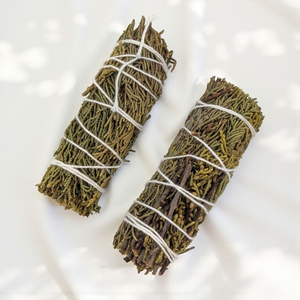 Two pure juniper bundle for protection and cleansing tied with twine on a white background available at zen collection crystal store barrie