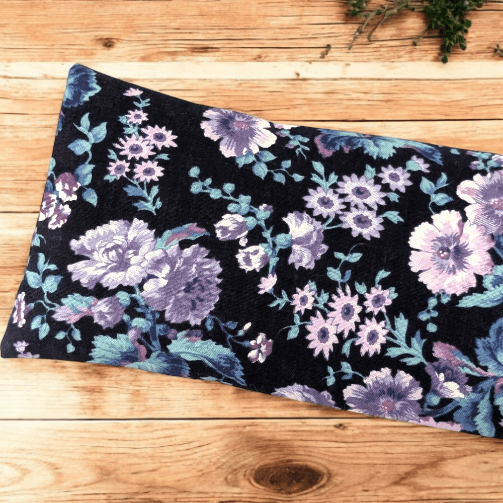 Weighted eye pillow with delicate floral cotton design
