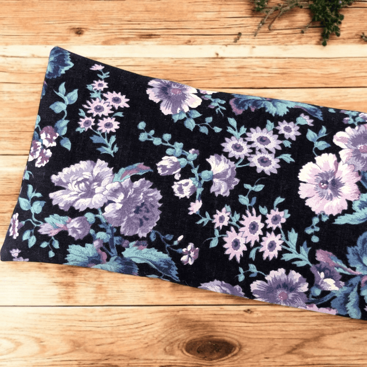 Weighted eye pillow with delicate floral cotton design