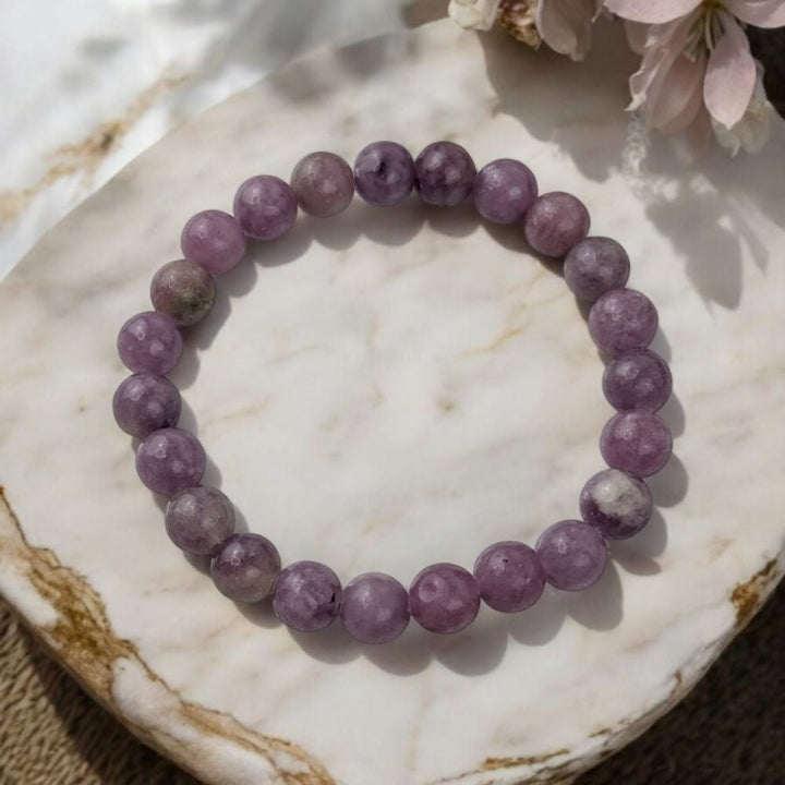 Genuine Lepidolite bracelet from Canadian crystal store. Crystals for the crown chakra. Shop in-store or online with Zen Collection