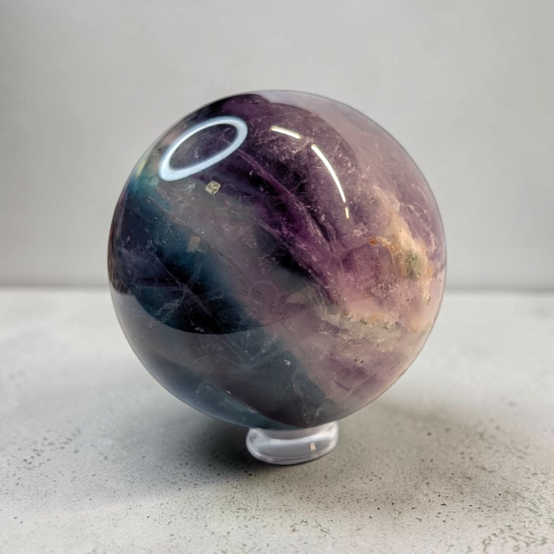 Rainbow fluorite crystal sphere, 287 grams, 2 inch round, banded purple and green fluorite