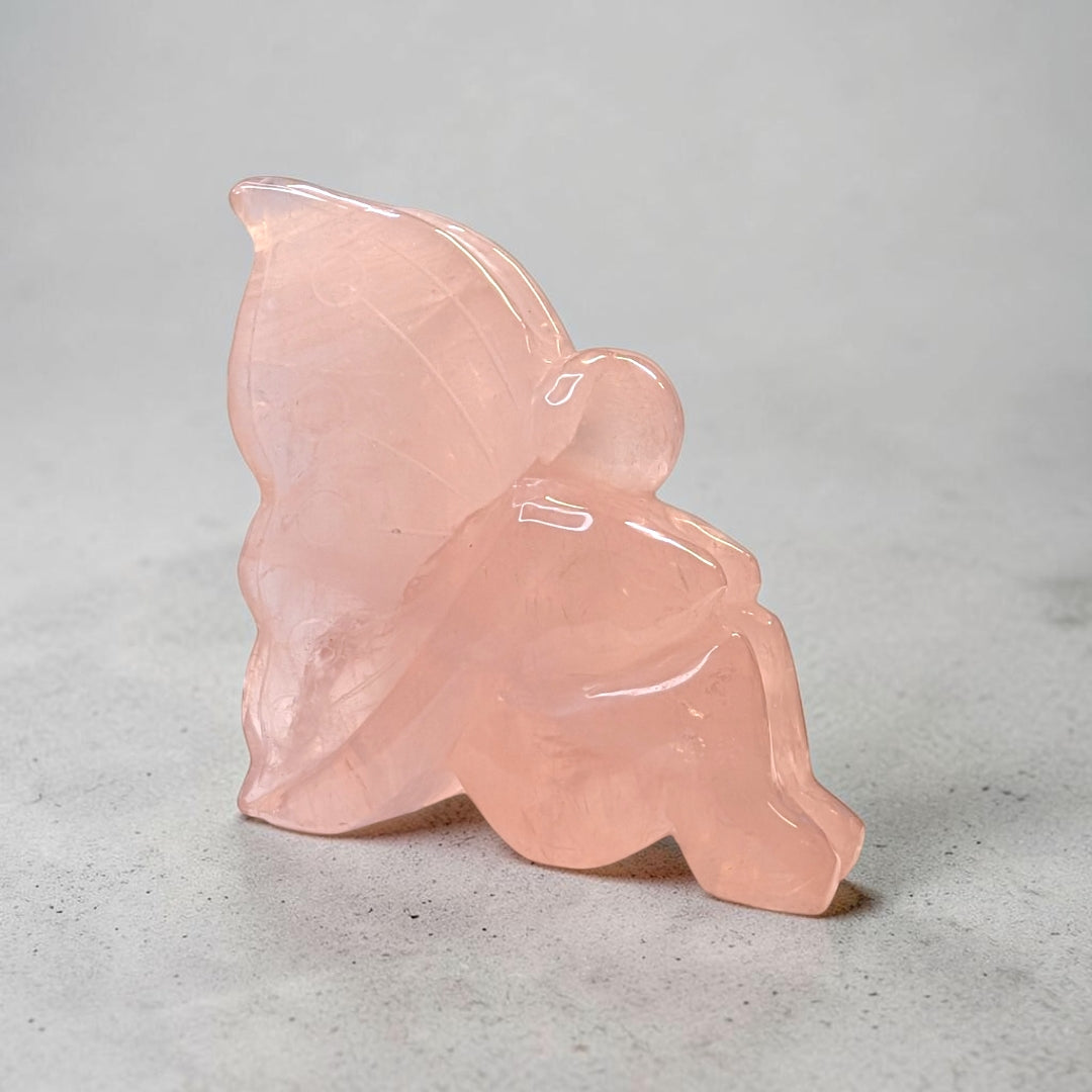 Rose quartz crystal fairy carving, 435 grams, 4 by 1.5 by 3.5 inches, soft pink rose quartz