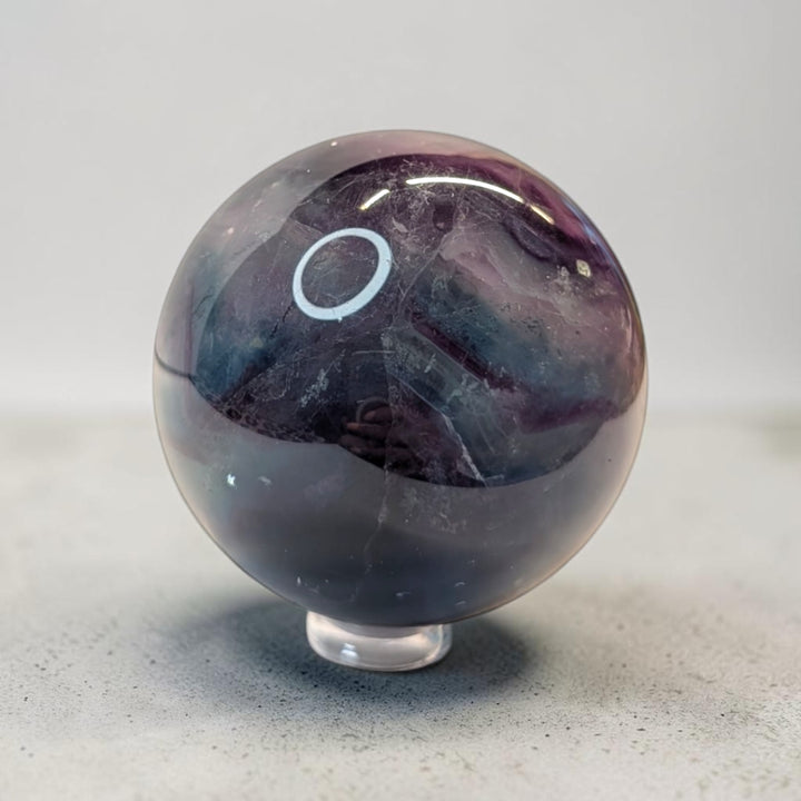 Rainbow fluorite crystal sphere, 287 grams, 2 inch round, banded purple and green fluorite