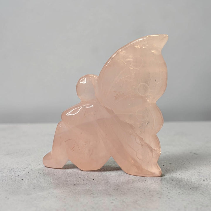 Rose quartz crystal fairy carving, 435 grams, 4 by 1.5 by 3.5 inches, soft pink rose quartz