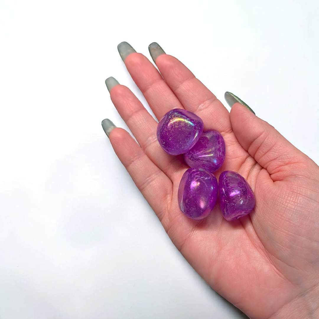 Vibrant purple tumbled Purple Aura Quartz pocket stone for intuition and crown activation