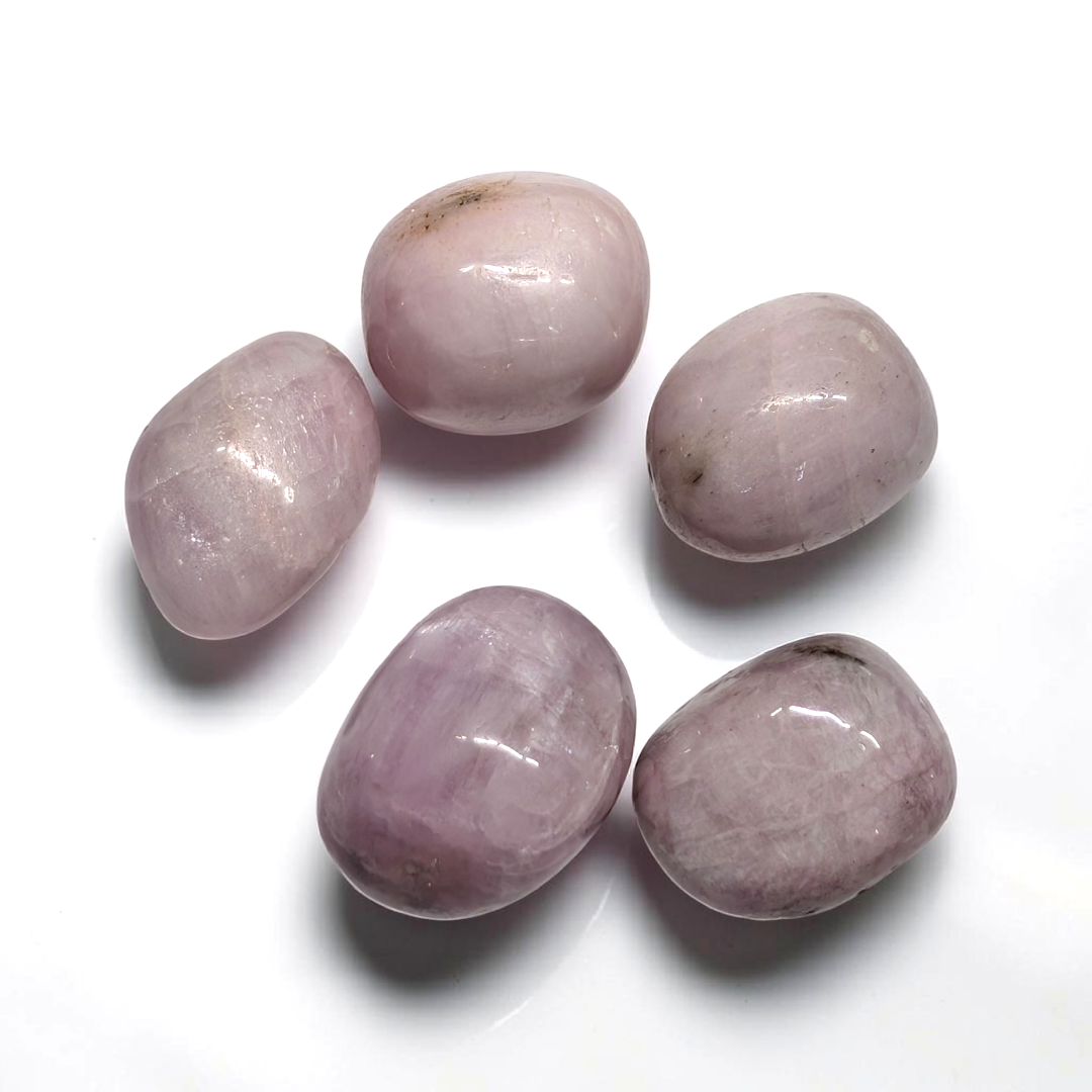 Tumbled Kunzite crystal pocket stone for emotional healing and heart chakra support