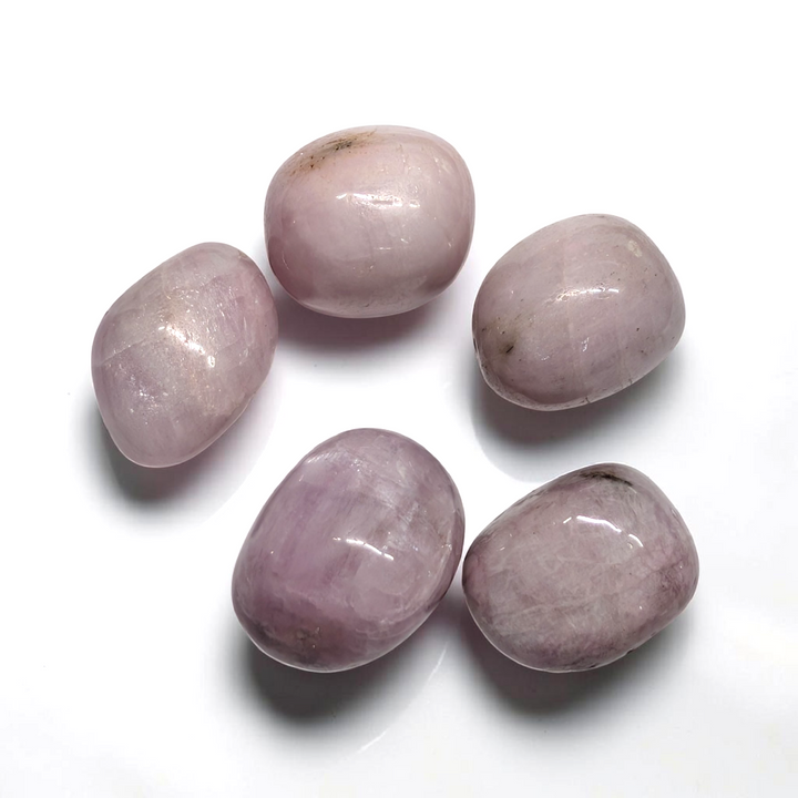 Tumbled Kunzite crystal pocket stone for emotional healing and heart chakra support