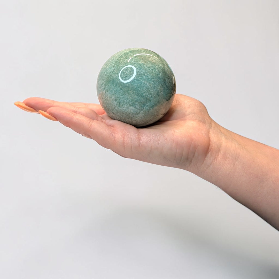 Amazonite crystal sphere, 405 grams, 2.5 inch round, sage green with white veining