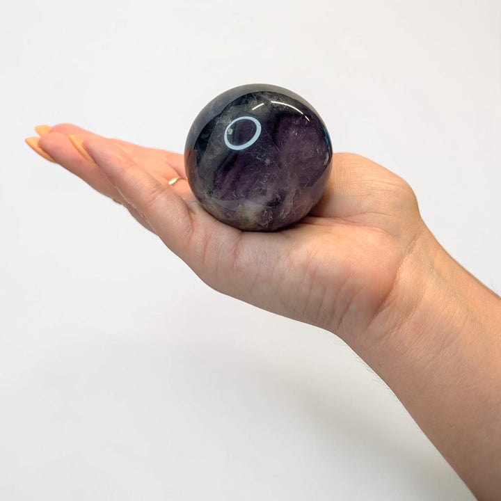 Rainbow fluorite crystal sphere, 287 grams, 2 inch round, banded purple and green fluorite
