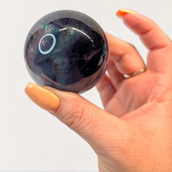 Rainbow fluorite crystal sphere, 287 grams, 2 inch round, banded purple and green fluorite
