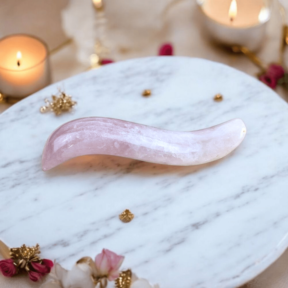 Polished rose quartz massage tool