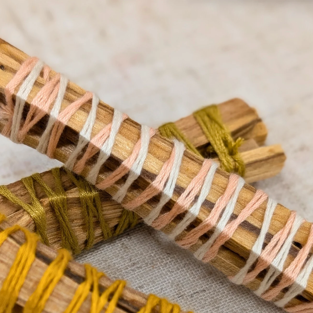 Palo Santo is a sacred wood that  originates from Peru. The sweet and welcoming aroma of palo Santo is a great aromatic purifier of your home, aura or crystals . We split and hand wrap these bundles to optimize your experience 