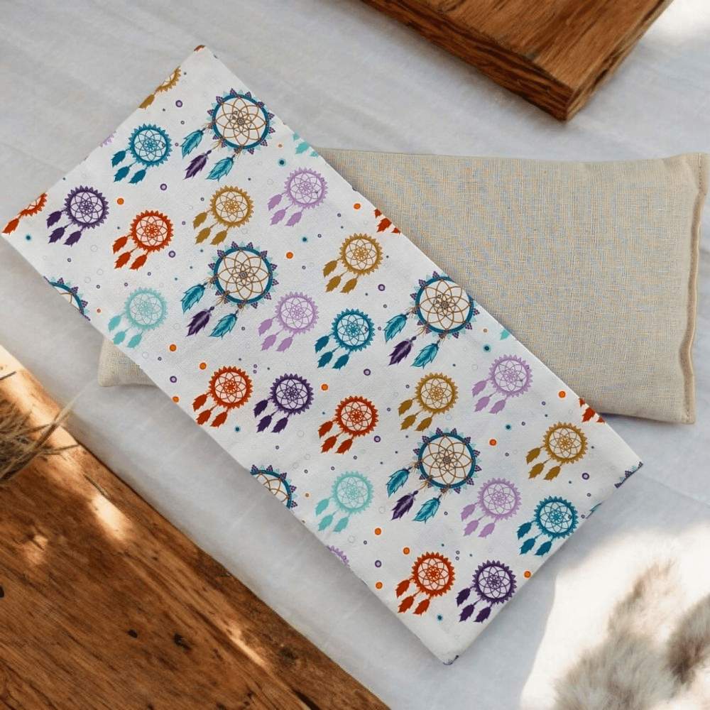 Weighted eye pillow filled with flaxseed and herbs