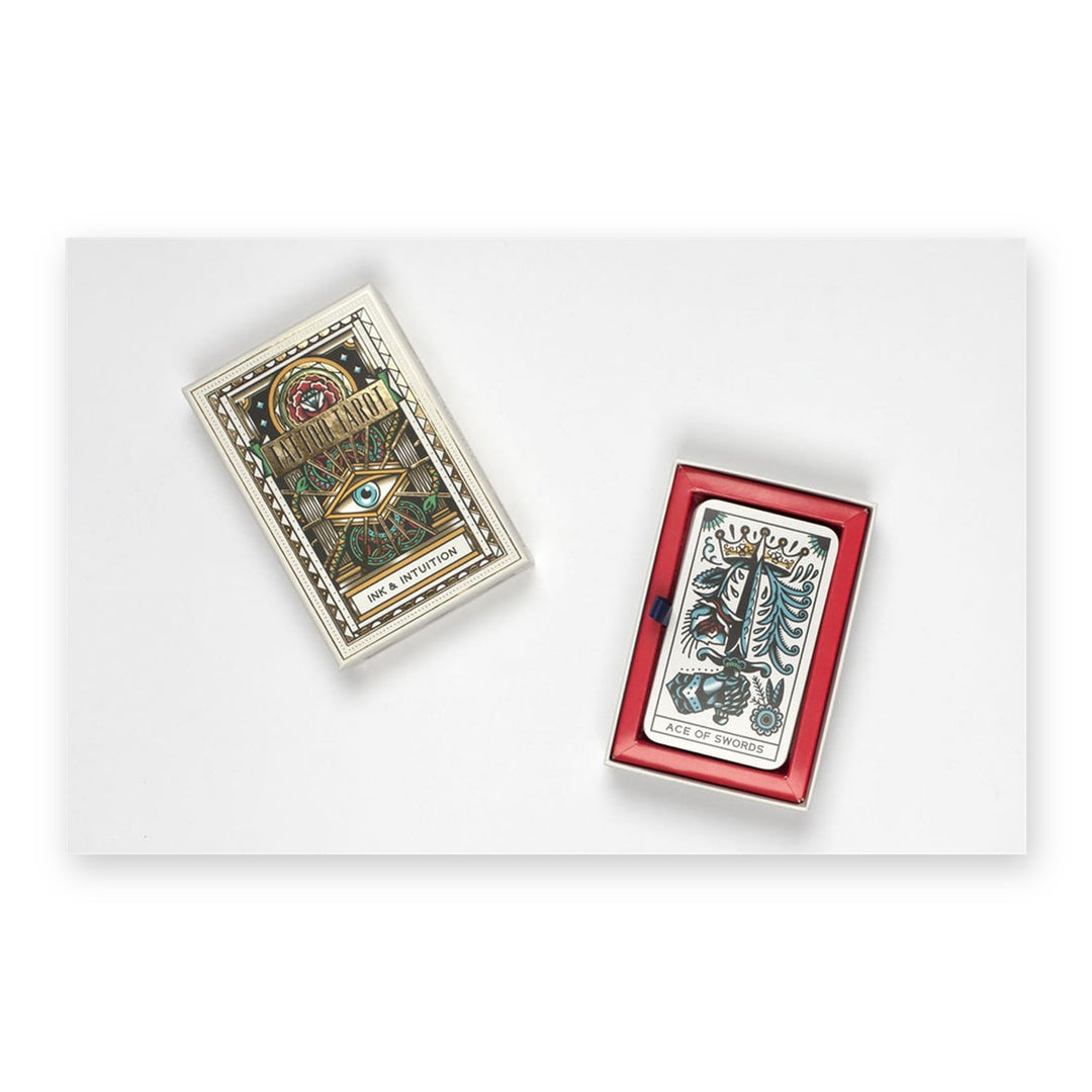 Tattoo Tarot box open, with the Ace of Swords card