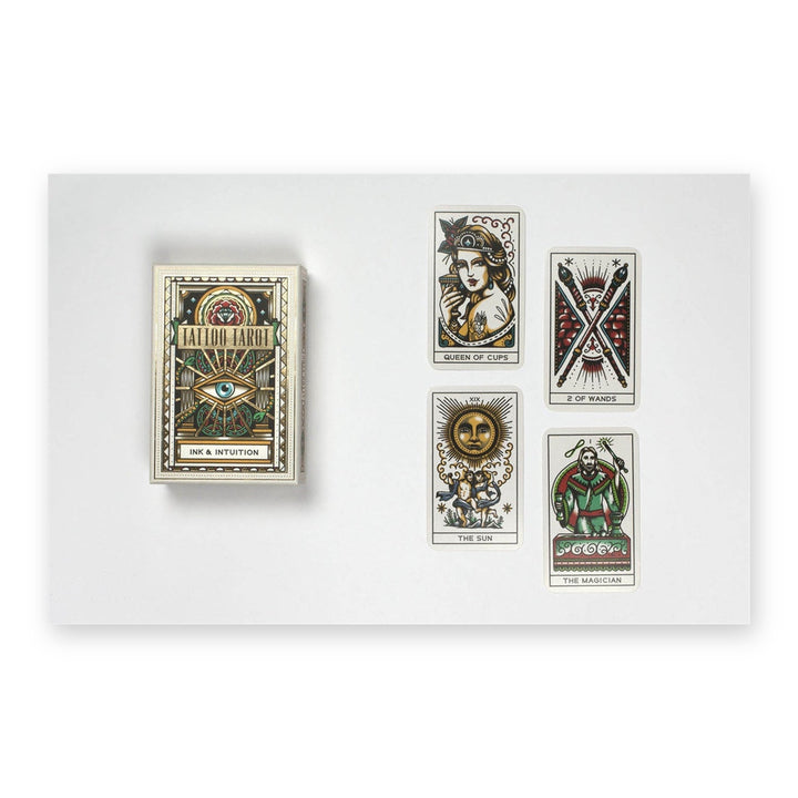 Tattoo Tarot box with four cards: Queen of Cups, Two of Wands, The Sun and The Magician