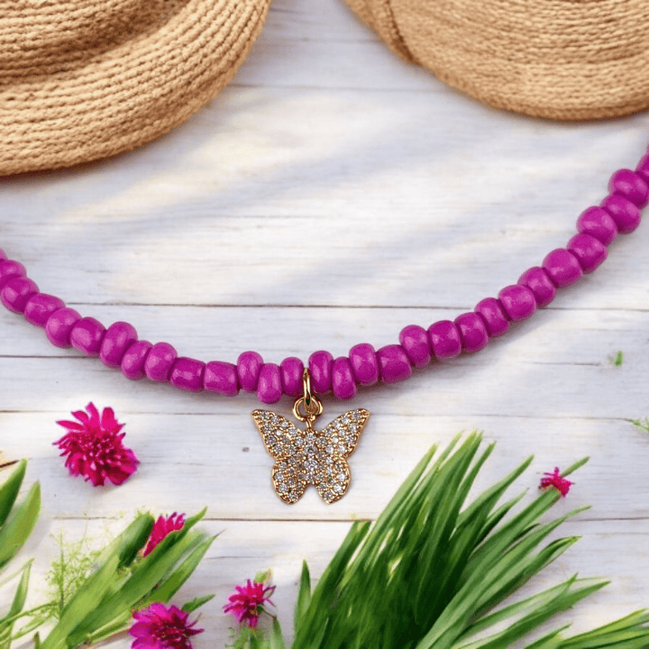 pink butterfly necklace and bracelets
