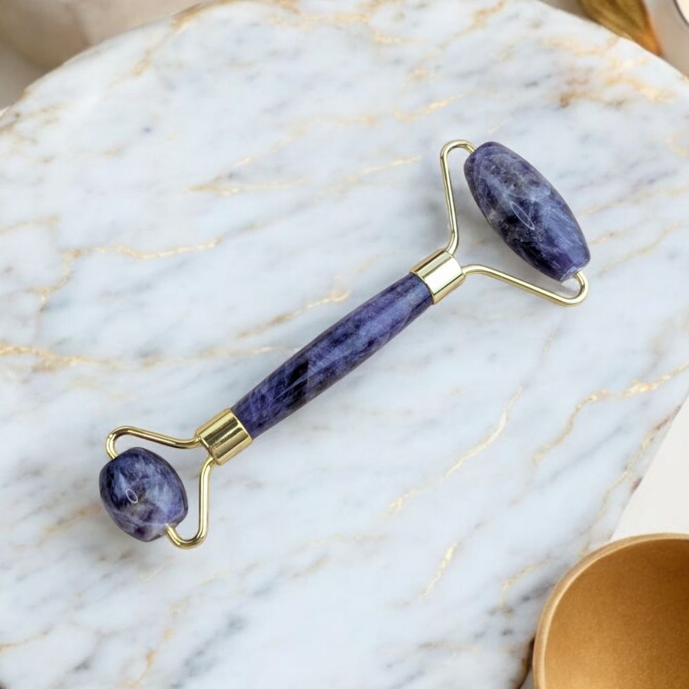 Natural Amethyst Facial Roller with gold accents available at Zen Collection Metaphysical Store