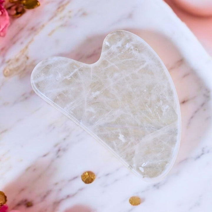 Rose Quartz Gua Sha for facial massage available at Zen Collection Metaphysical Store