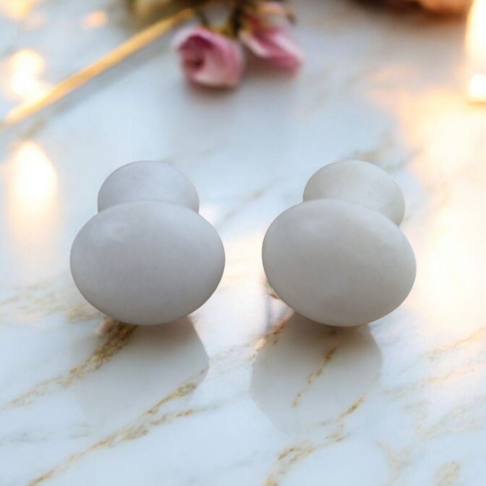 Crystal healing with a natural White Jade Personal Massager available at Zen Collection Metaphysical Store