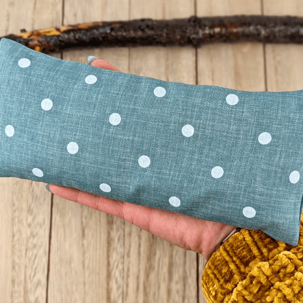 Relaxing green polka dot eye pillow for meditation