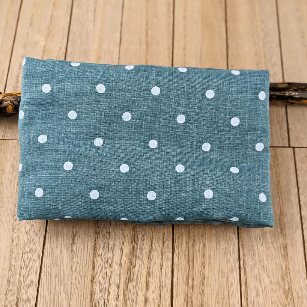 Green polka dot neck wrap with flaxseed and herbs