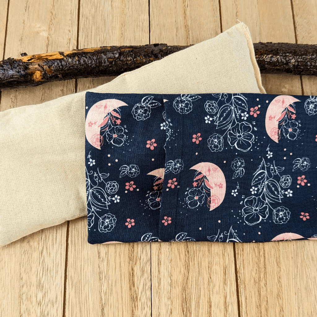 Eye pillow in navy blue and soft pink fabric for sleep and relaxation