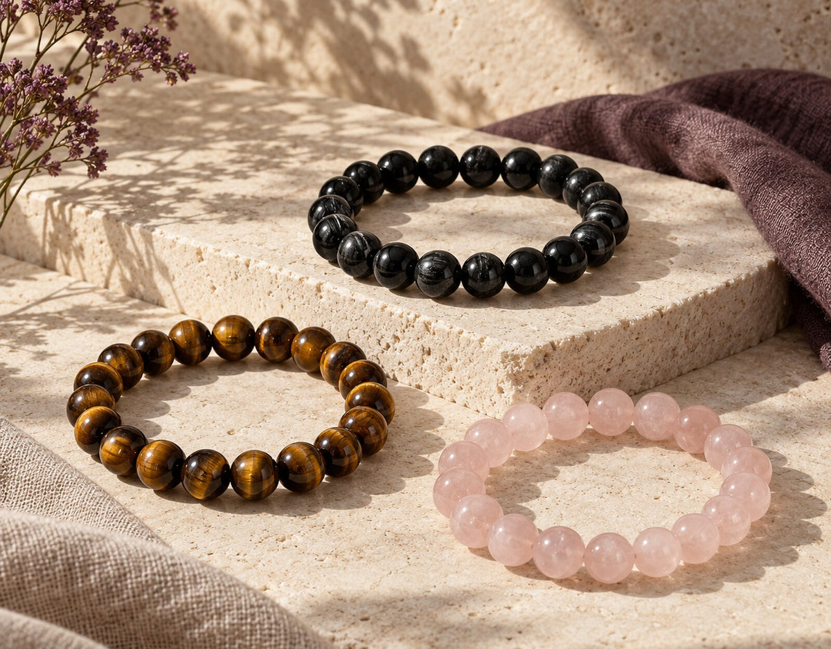 Crystal bead bracelets styled on warm limestone for Zen Collection’s Crystal Bracelets collection.